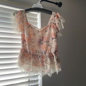 Peplum top with lace detail